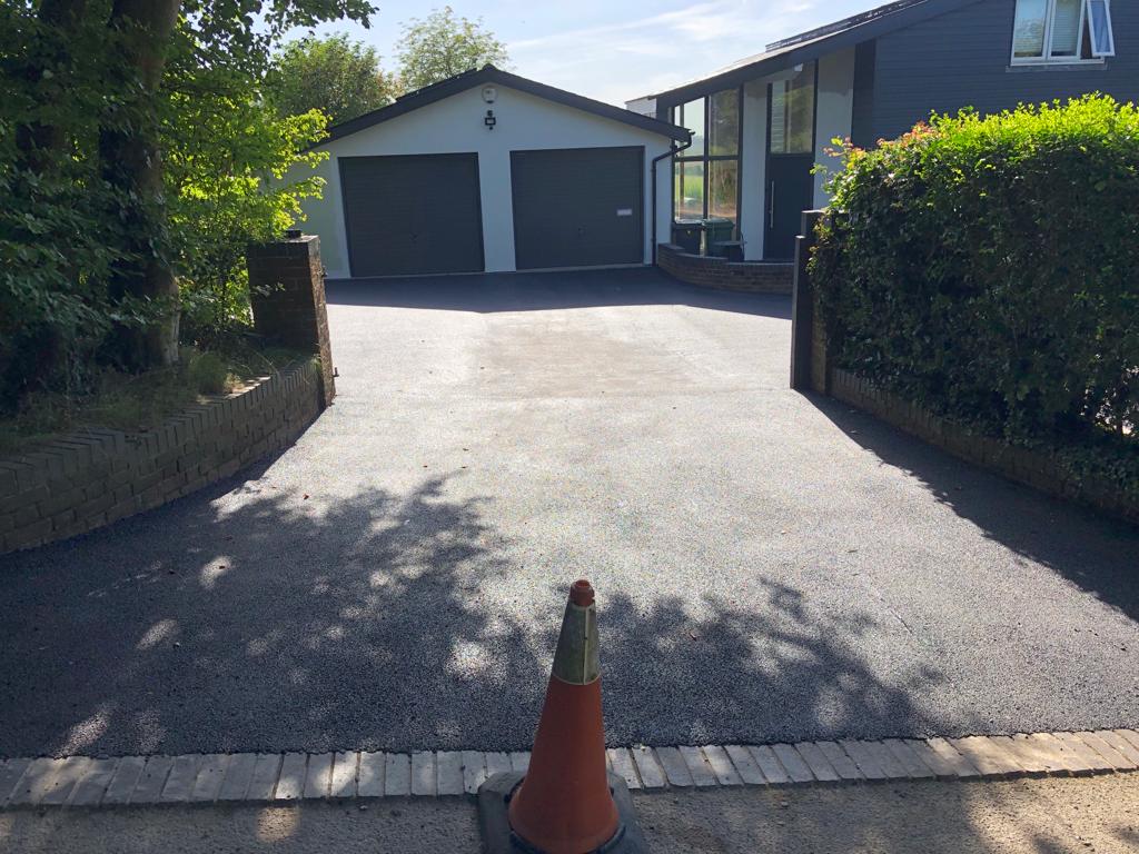 This is a photo of a bitumen driveway which is in the process of being installed by Footscray Road Tech