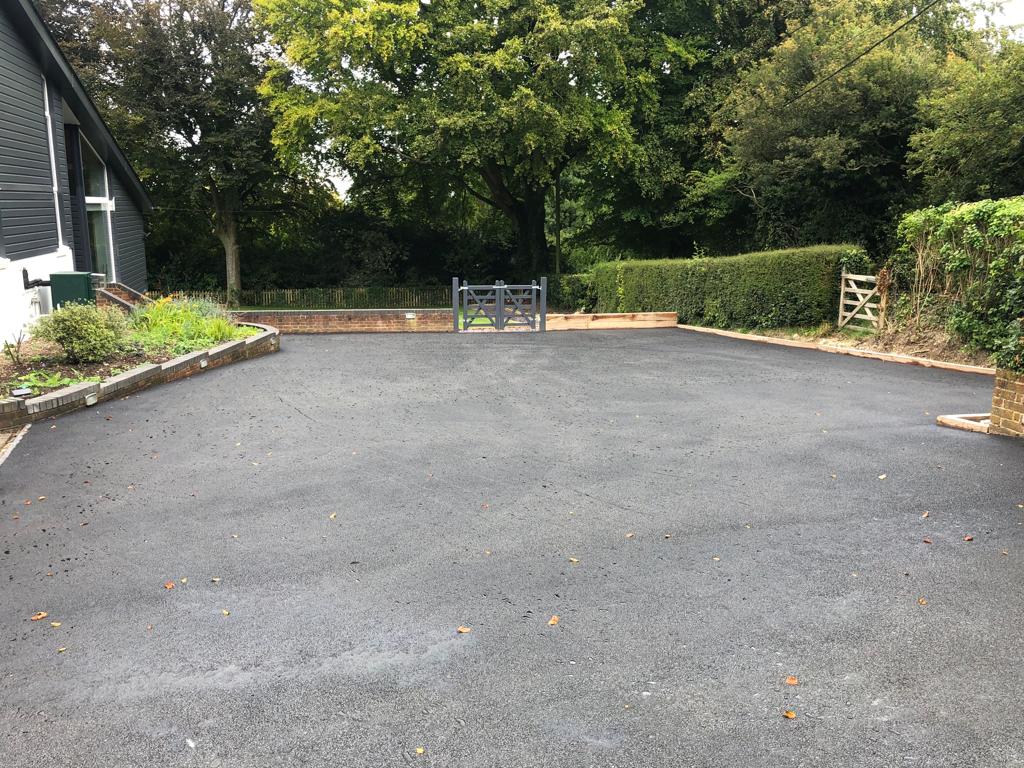 This is a photo of a bitumen driveway which is in the process of being installed by Footscray Road Tech